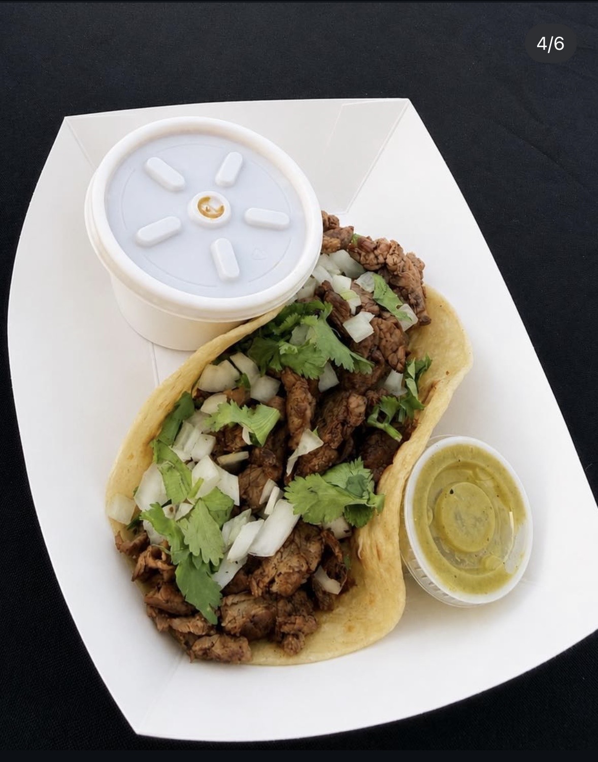 Beef fajita street tacos with onion, cilantro and salsa